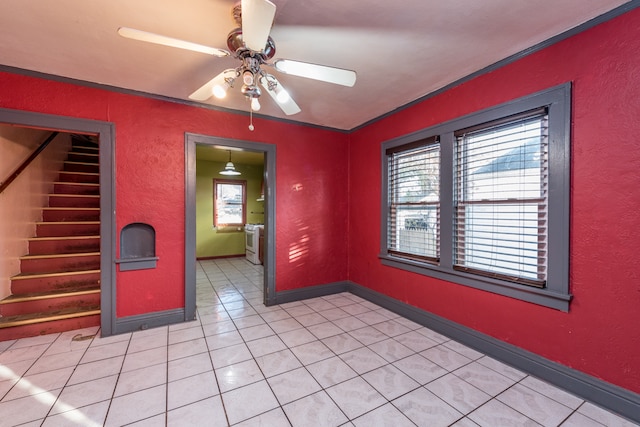 interior space featuring ceiling fan