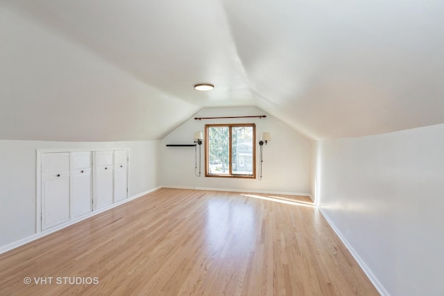 14557 W Ave, Orland Park, IL 60462 - bonus room with light wood-style floors, lofted ceiling, and baseboards