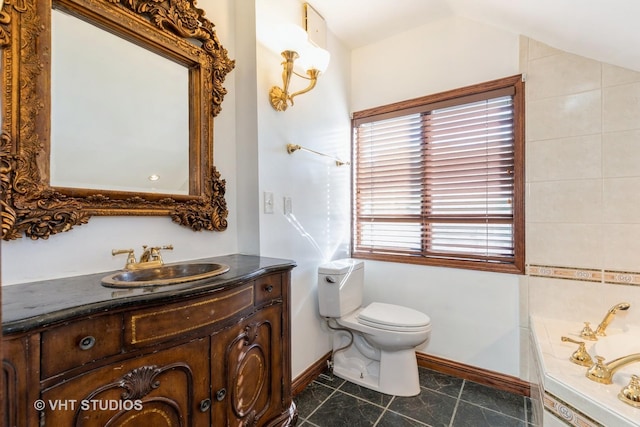 14557 W Ave, Orland Park, IL 60462 - bathroom featuring vanity, a bath, toilet, baseboards, and tile patterned flooring