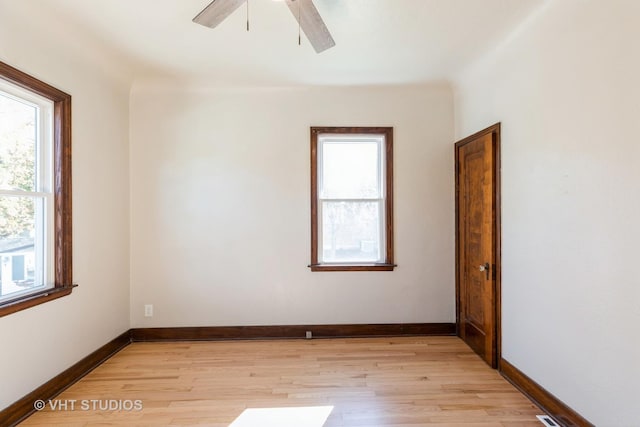 14557 W Ave, Orland Park, IL 60462 - spare room with light wood-style flooring, a ceiling fan, and baseboards