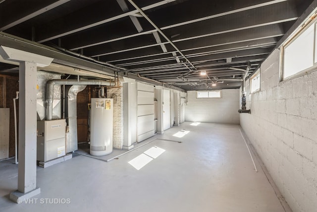 basement with heating unit and gas water heater