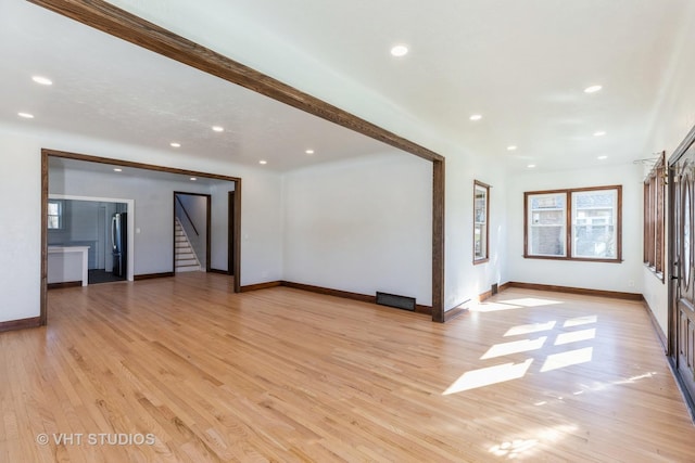 14557 W Ave, Orland Park, IL 60462 - unfurnished living room with stairs, light wood-type flooring, baseboards, and recessed lighting