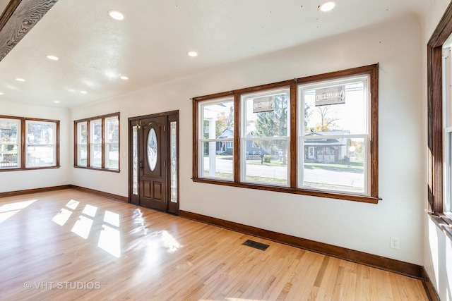 14557 W Ave, Orland Park, IL 60462 - foyer entrance with plenty of natural light, baseboards, light wood finished floors, and recessed lighting