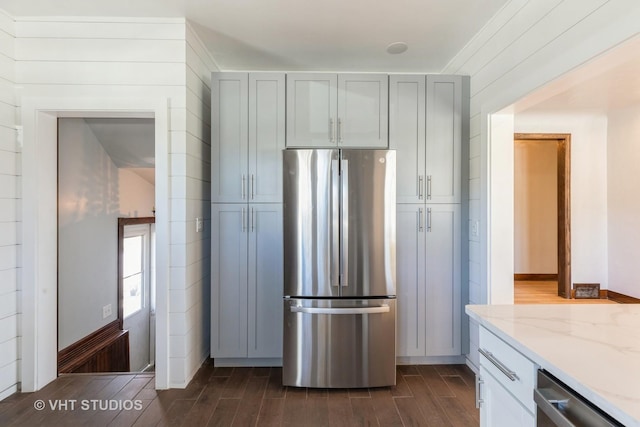 14557 W Ave, Orland Park, IL 60462 - kitchen featuring stainless steel appliances, dark wood-type flooring, light stone countertops, and gray cabinetry