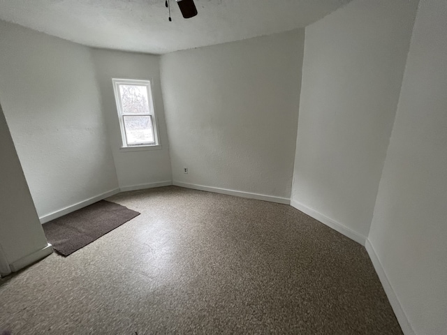 unfurnished room featuring ceiling fan