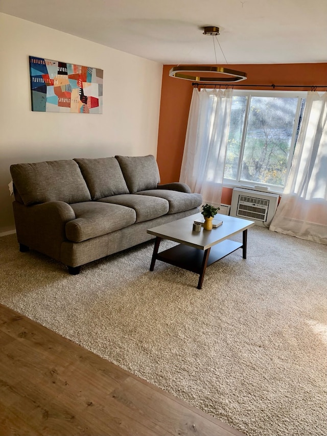 living room featuring a wall mounted air conditioner