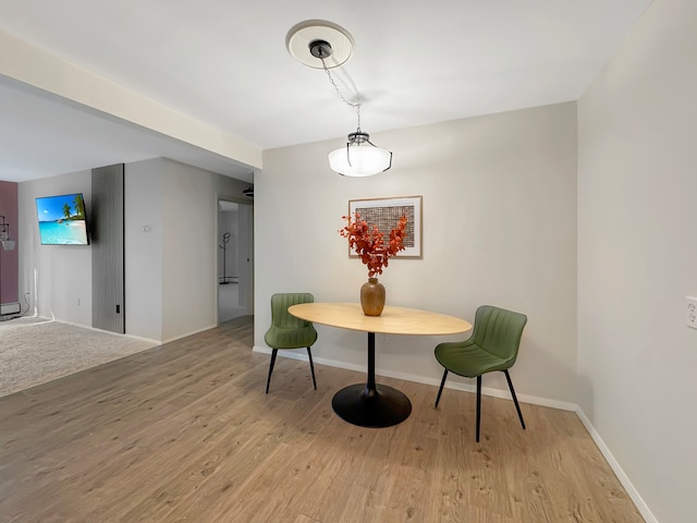 dining room with light hardwood / wood-style floors