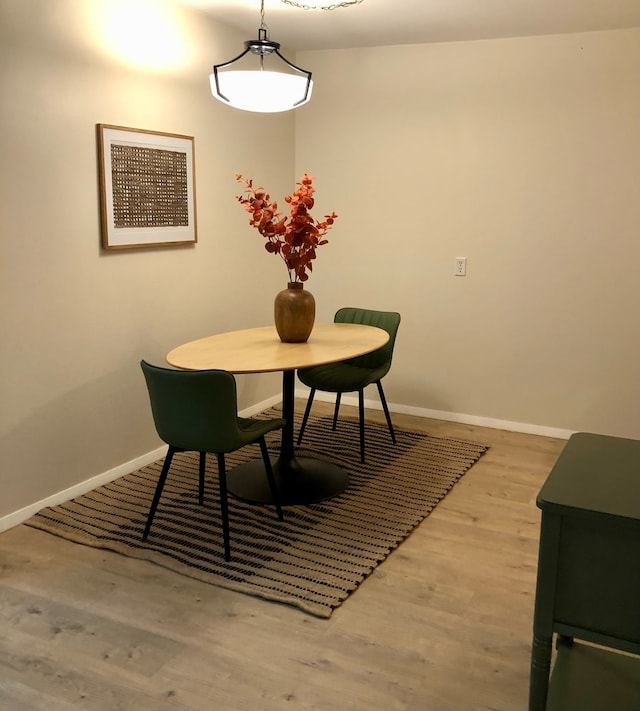 dining room featuring hardwood / wood-style flooring