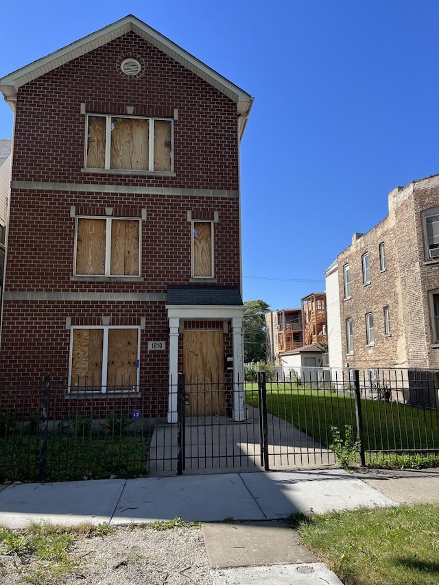 1810 S Hamlin Ave, Chicago, IL 60623 - view of front of home with brick siding and a gate