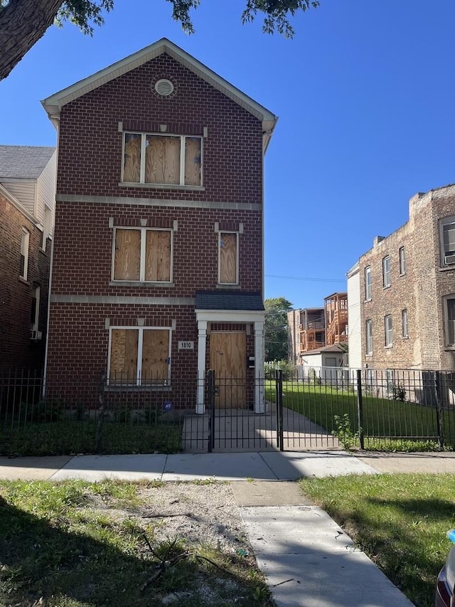 1810 S Hamlin Ave, Chicago, IL 60623 - view of front of house featuring brick siding and a gate