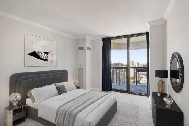 bedroom with ornamental molding, light carpet, and access to outside