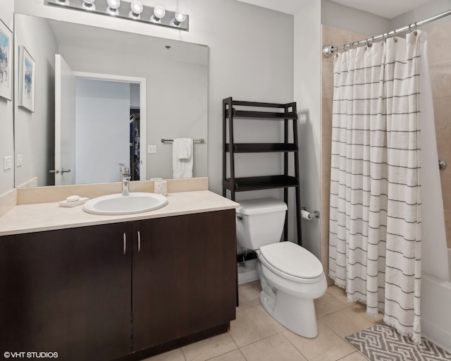 full bathroom with vanity, tile patterned flooring, toilet, and shower / bath combo