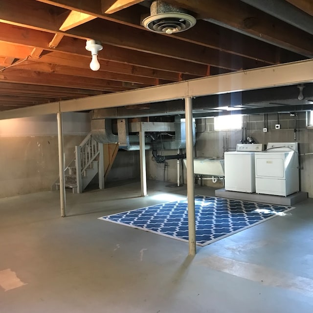 basement featuring washer and dryer