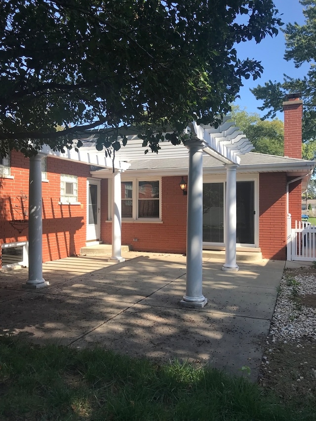 rear view of house with a patio area