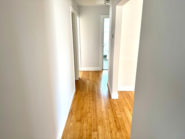 hall featuring light wood-type flooring