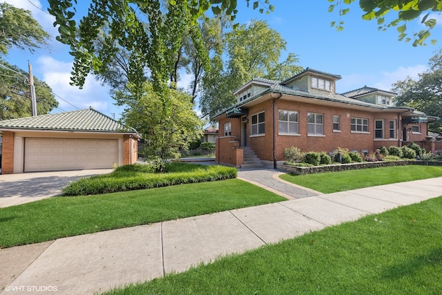 view of front facade featuring a front yard and a garage