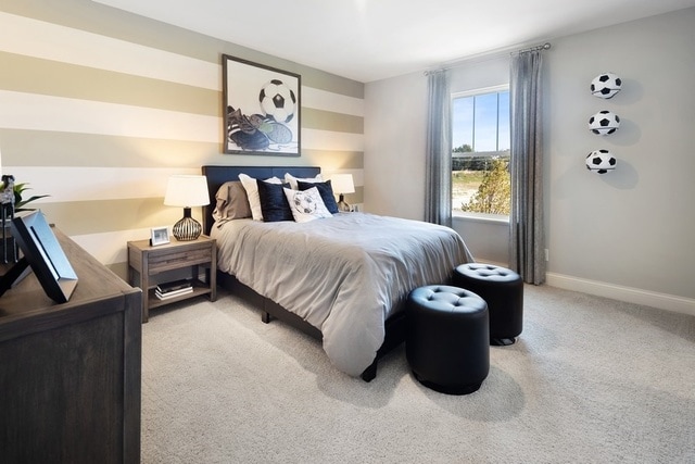 bedroom with light colored carpet