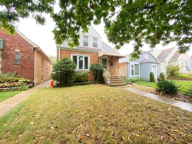 view of front of property with a front lawn