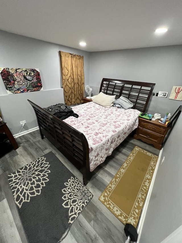 bedroom featuring hardwood / wood-style floors