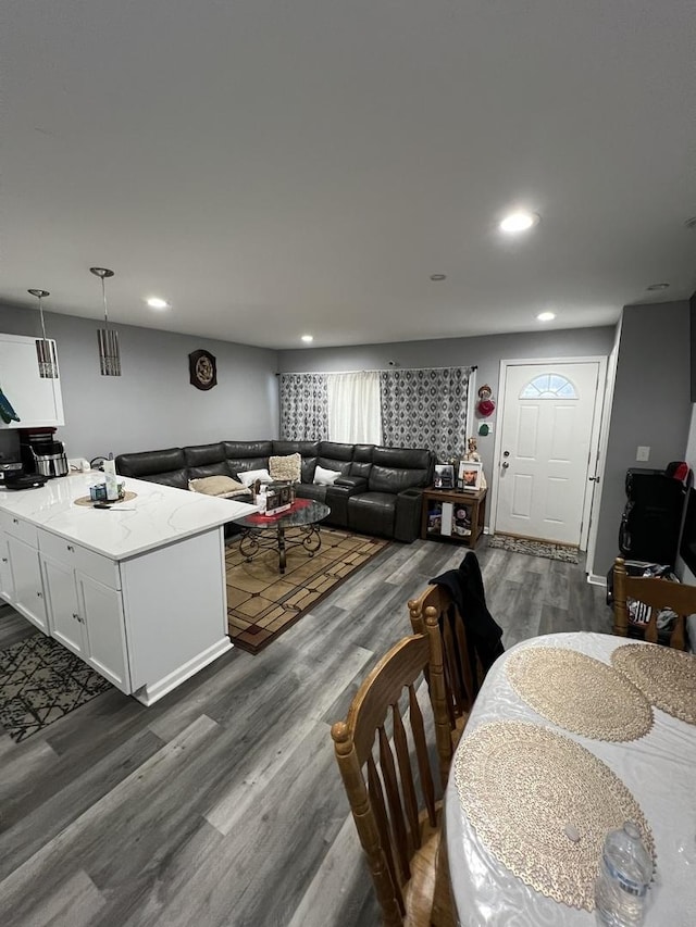 dining room with dark hardwood / wood-style flooring