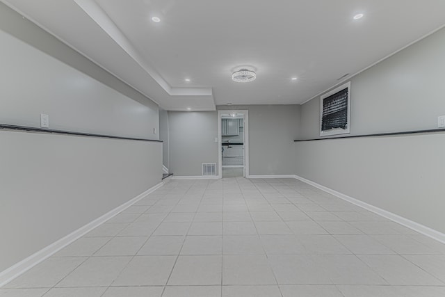 empty room with light tile patterned floors