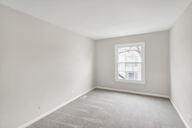 empty room with carpet flooring