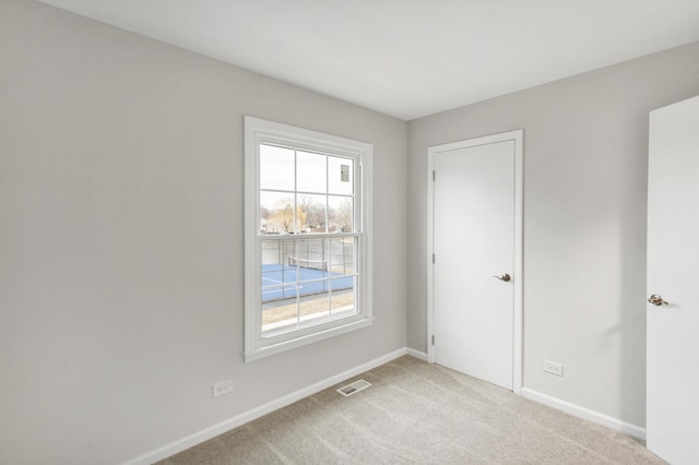 view of carpeted spare room