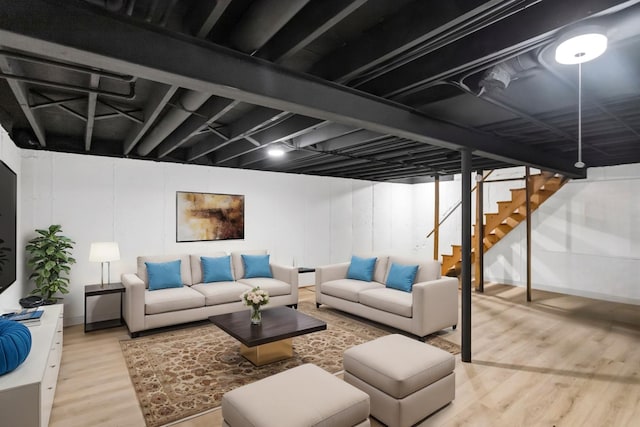 basement featuring hardwood / wood-style floors