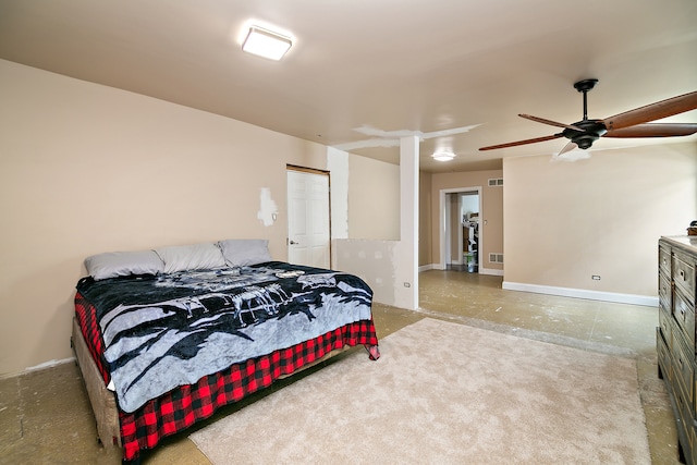 bedroom featuring ceiling fan and a closet