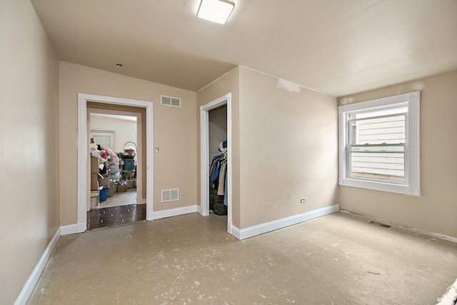 unfurnished bedroom with a closet