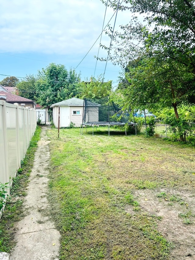 view of yard with a trampoline