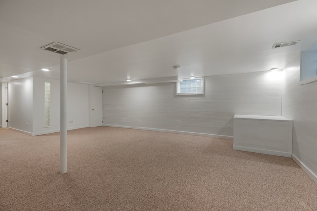 basement with light colored carpet