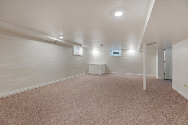 basement featuring carpet flooring