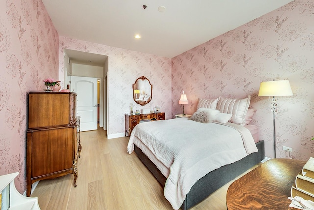 bedroom with light hardwood / wood-style flooring