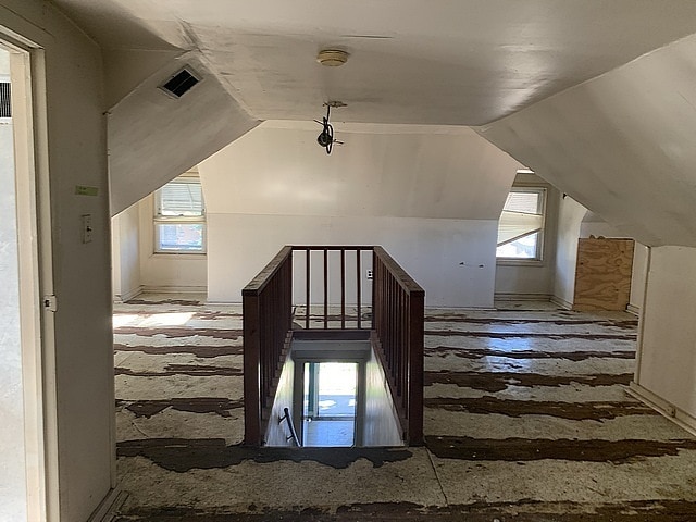 bonus room with vaulted ceiling