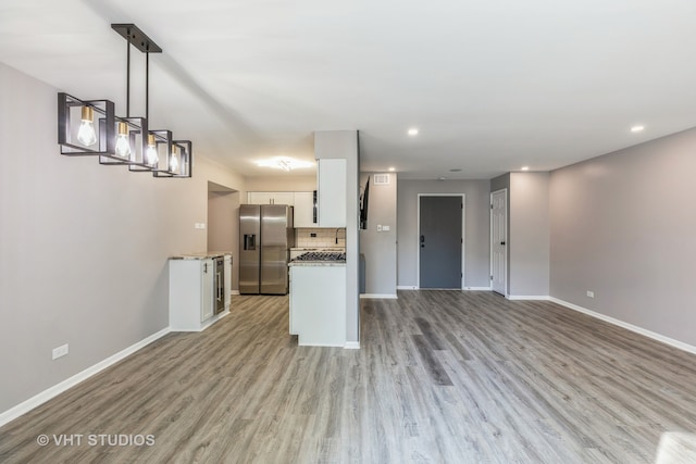 interior space featuring light hardwood / wood-style flooring and sink