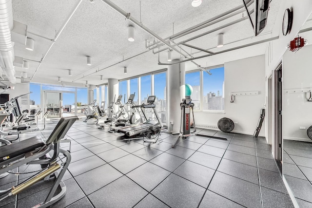 gym with a textured ceiling