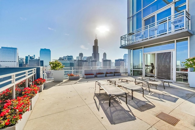 view of patio featuring a balcony