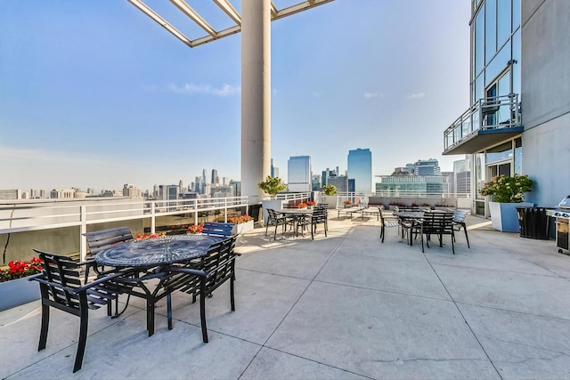 view of patio featuring a balcony