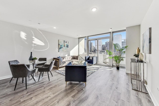 living room featuring hardwood / wood-style floors and expansive windows