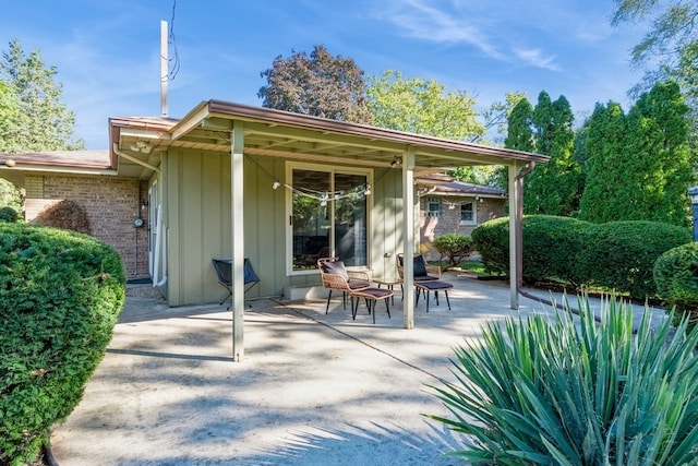 back of property featuring a patio area