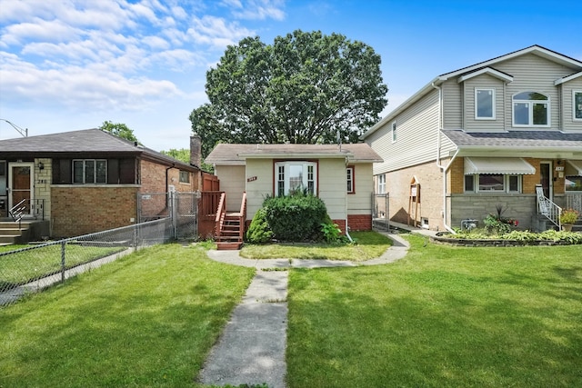 view of front of home with a front lawn