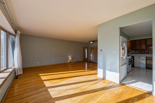 unfurnished room featuring light hardwood / wood-style flooring