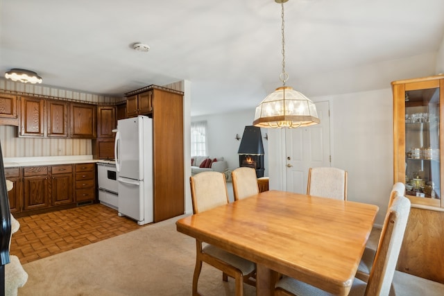 view of carpeted dining space