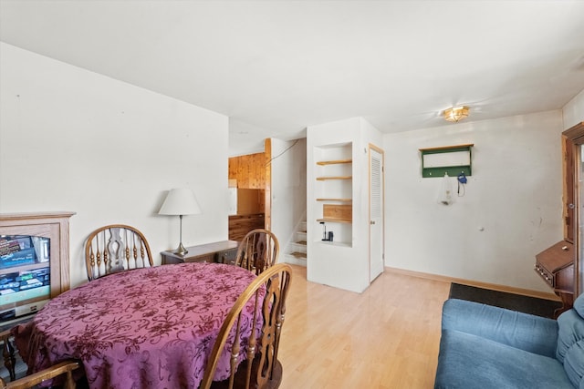 dining room with light hardwood / wood-style flooring