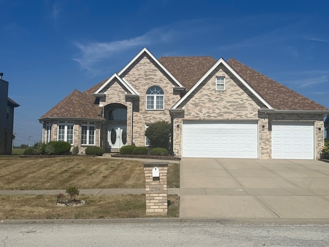 view of front of house with a front lawn