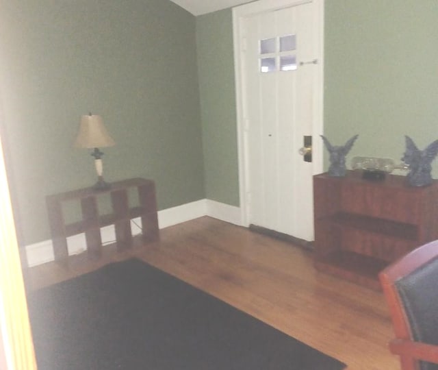 entrance foyer with hardwood / wood-style floors