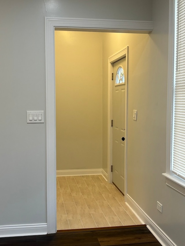 foyer with hardwood / wood-style floors