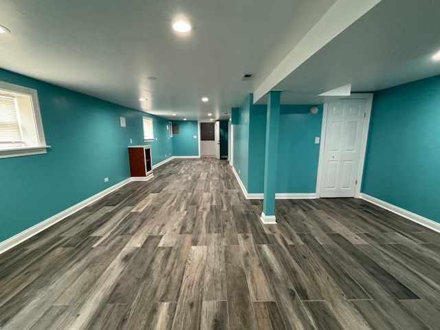 interior space with dark hardwood / wood-style floors