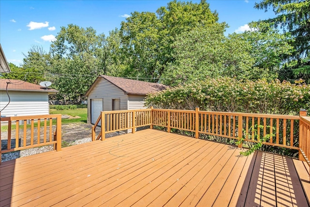 wooden deck featuring an outbuilding